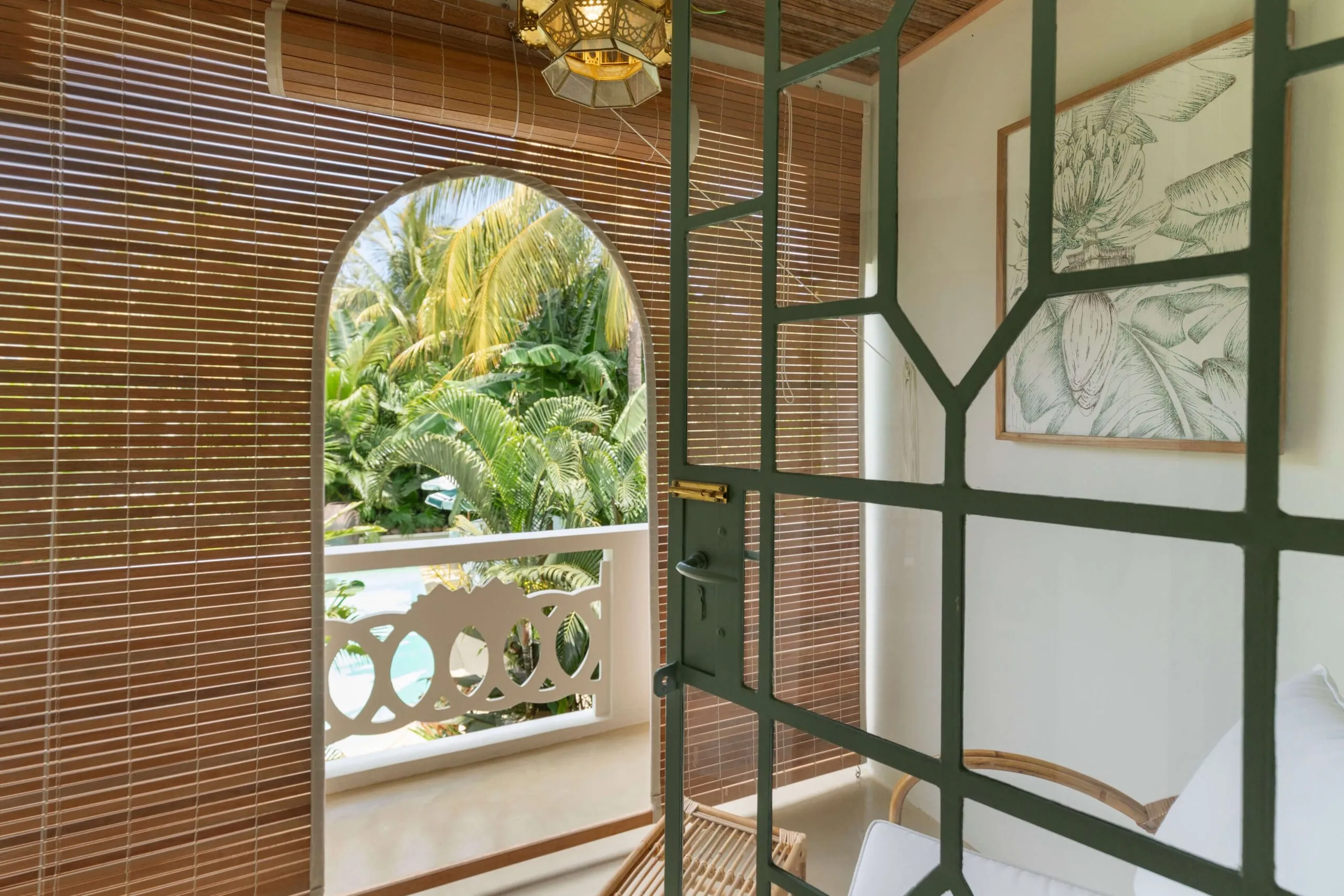 Each suite opens to a private balcony with relaxed lounge seating